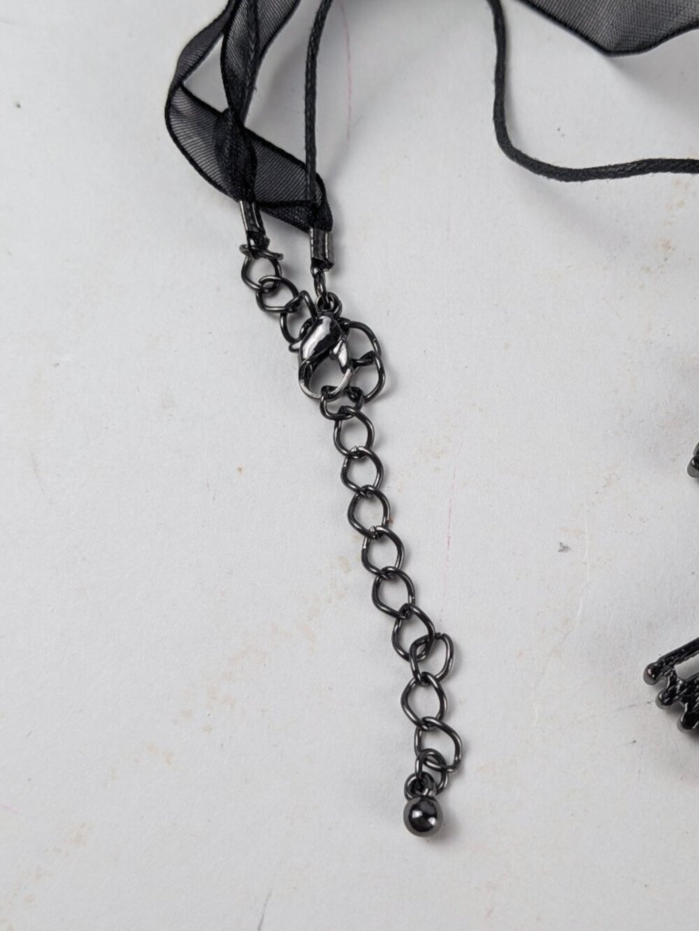 Purple/Black Rhinestone Cross Ribbon Necklace - Picture 5 of 5